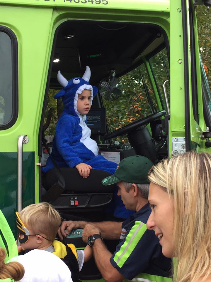 Little Kid Dressed Up As A Monster At Community Event