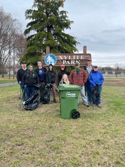 Employees Doing Community Service At Xylite Park, Picking Up Trash