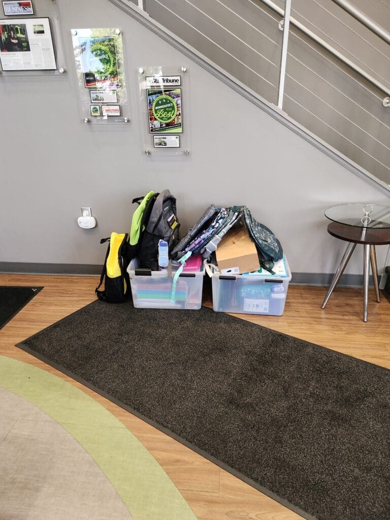 Kids Back-To-School Drive Items in Bins